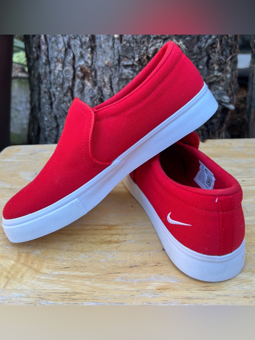Nike women’s Red Slip-On Canvas Sneakers with White Outsole